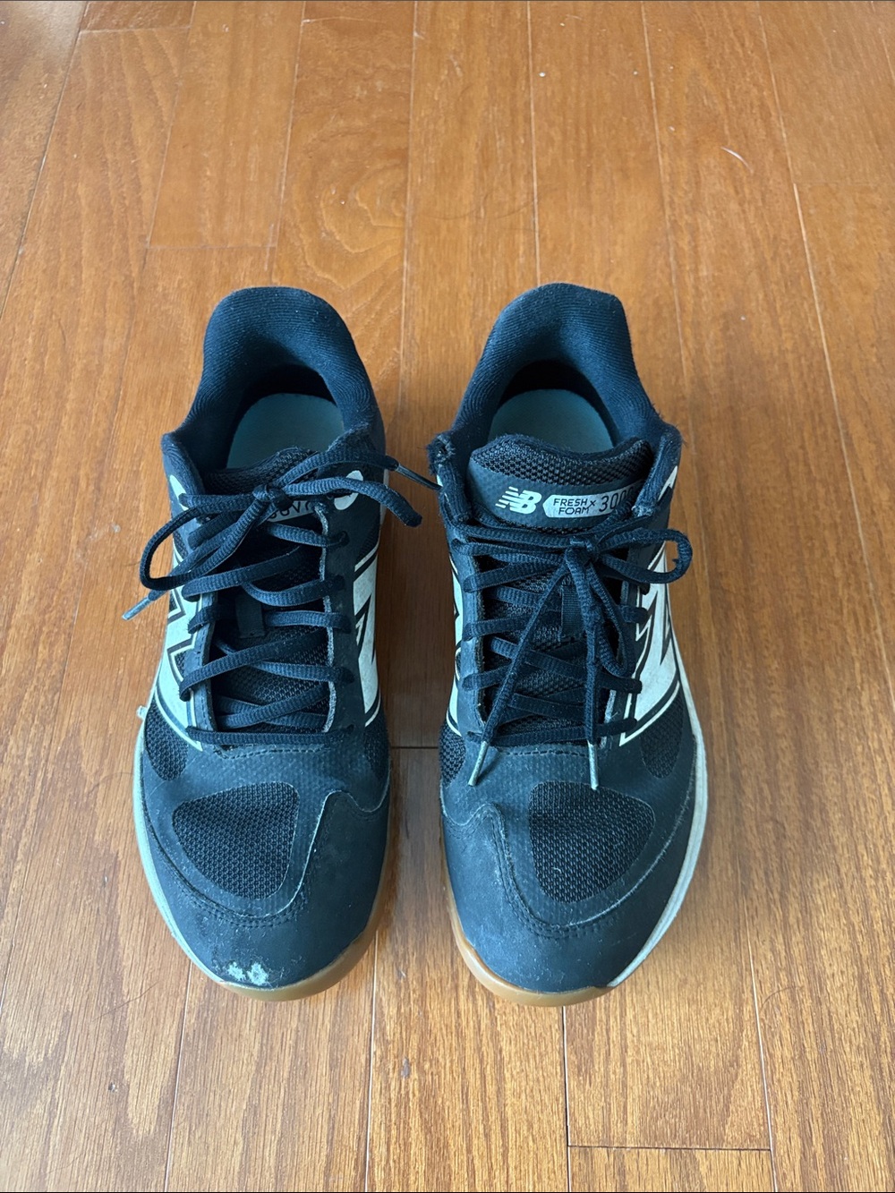New Balance Black and White Turf Shoes